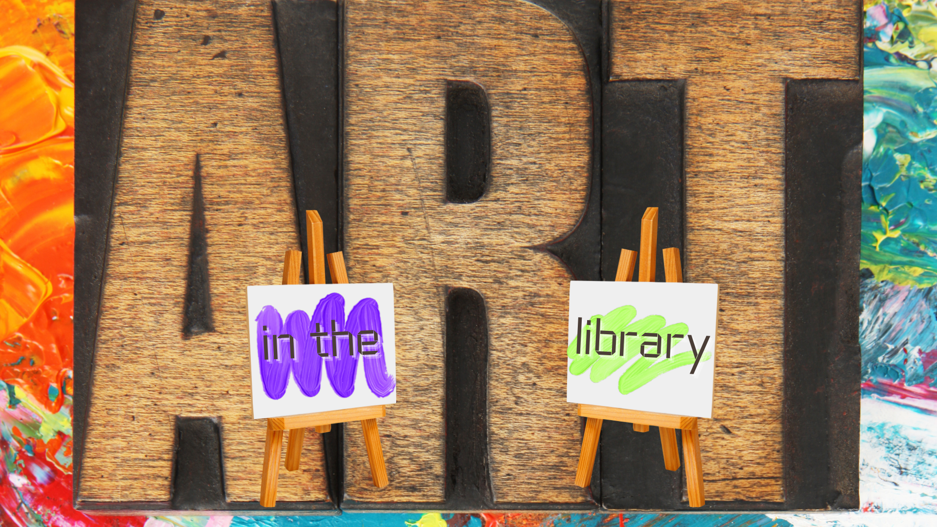 Woodblock letters spell out ART. Two easels display "in the" and "library."